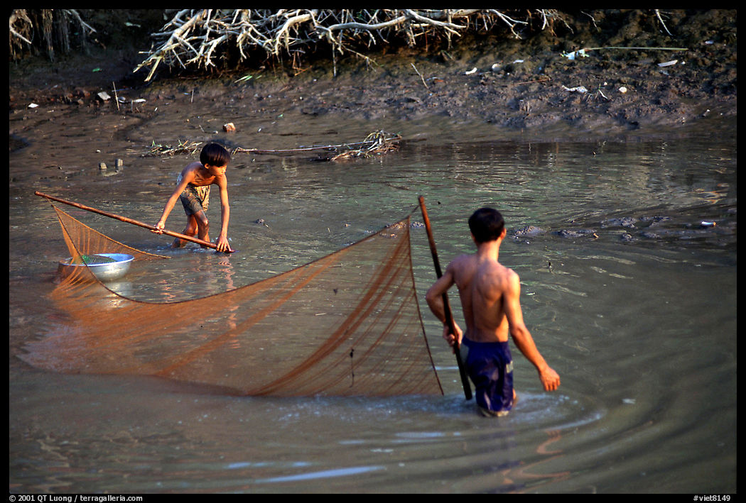 Fishing the river, near Long Xuyen. Mekong Delta region, Vietnam