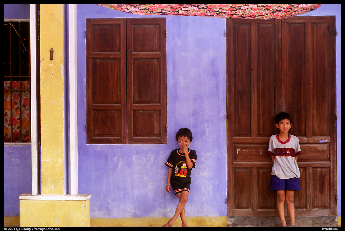 Children in front of old house, Hoi An. Vietnam