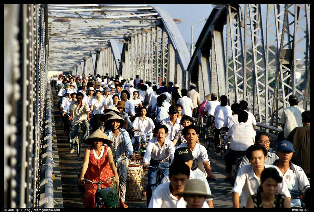 Rush hour on the Trang Tien bridge. The numbers of cars is insignificant compared to Ho Chi Minh city. Hue, Vietnam