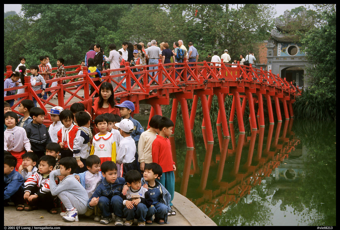 The romantic Huc bridge leading to Ngoc Son temple  in Hoan Kiem lake. Hanoi, Vietnam