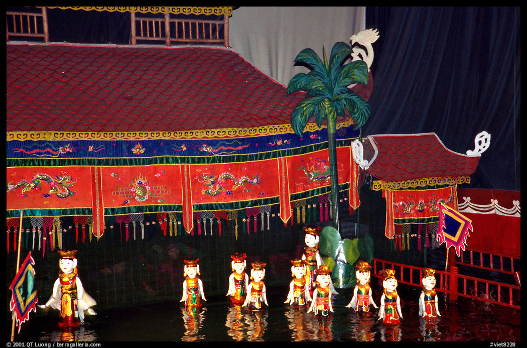 Water puppets performance. Artists are hidden behind the curtain and move the puppets with a complex system of sticks. Hanoi, Vietnam