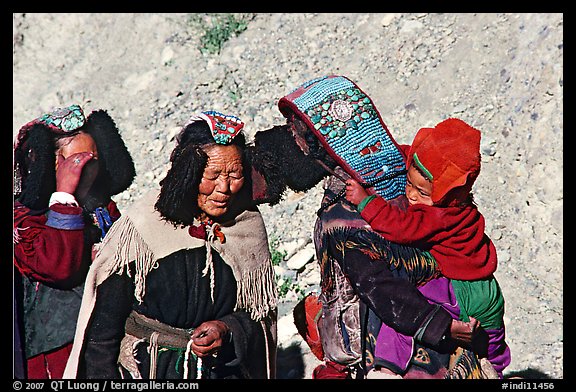 Elderly women with turquoise-covered head adornments, Zanskar, Jammu and Kashmir. India (color)