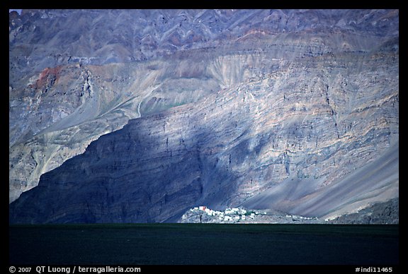 Monastary at the base of tall cliffs, Zanskar, Jammu and Kashmir. India (color)