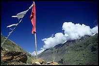 Prayer flag and cloud-capped peak, Himachal Pradesh. India ( color)