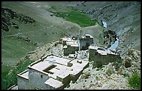 Terraced roofs of village above river valley, Zanskar, Jammu and Kashmir. India