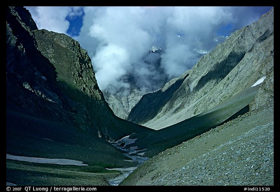 Valley with high cliffs and clouds, Zanskar, Jammu and Kashmir. India (color)