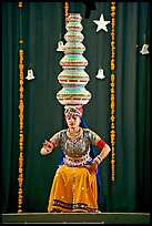 Rajasthani dancer balancing jars on head. New Delhi, India