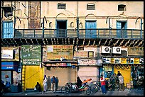 Street with old buildings and storefronts closed, Old Delhi. New Delhi, India