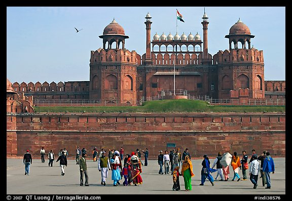 Tourists walking on esplanade in front of the Lahore Gate. New Delhi, India (color)