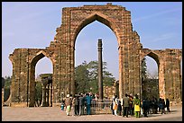 Iron pillar, and ruined mosque arch, Qutb complex. New Delhi, India