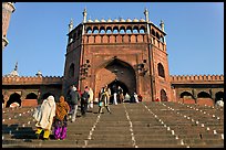 Muslim worshippers climbing  Jama Masjid South Gate. New Delhi, India