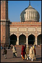 Group of people, courtyard, prayer hall, and dome, Jama Masjid. New Delhi, India