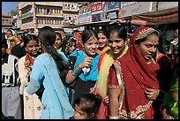 Young women during a wedding procession. Jodhpur, Rajasthan, India (color)