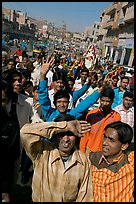 Young men walking in front of groom during a wedding procession. Jodhpur, Rajasthan, India