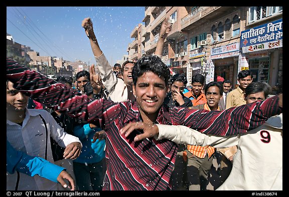 Young men celebrating during wedding procession. Jodhpur, Rajasthan, India (color)
