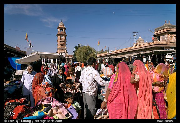 Sadar Market, with women in colorful sari and clock tower. Jodhpur, Rajasthan, India (color)