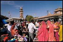 Sadar Market, with women in colorful sari and clock tower. Jodhpur, Rajasthan, India