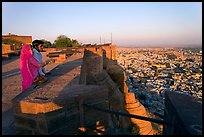 Couple looking at the view from Mehrangarh Fort. Jodhpur, Rajasthan, India (color)