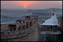 Sun setting over the Chamunda Devi temple, Mehrangarh Fort. Jodhpur, Rajasthan, India ( color)