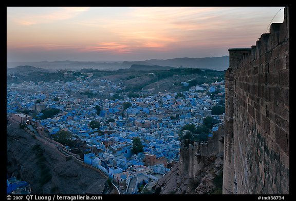 Mehrangarh Fort walls, and old city  blue houses, sunset. Jodhpur, Rajasthan, India