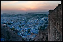 Mehrangarh Fort walls, and old city  blue houses, sunset. Jodhpur, Rajasthan, India ( color)