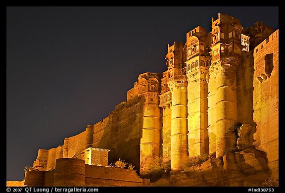 Towers and 36m high walls of Mehrangarh Fort by night. Jodhpur, Rajasthan, India