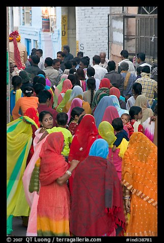 Narrow street filled by wedding procession. Jodhpur, Rajasthan, India (color)