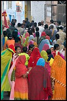 Narrow street filled by wedding procession. Jodhpur, Rajasthan, India (color)