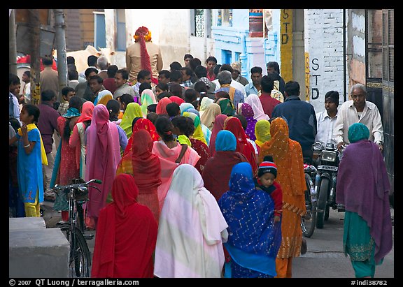 Women in colorful sari in a narrow street during wedding. Jodhpur, Rajasthan, India (color)