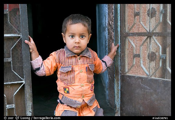 Boy in doorway. Jodhpur, Rajasthan, India (color)