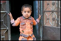 Boy in doorway. Jodhpur, Rajasthan, India (color)