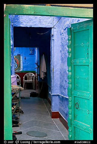 Doorway and inside of a house painted blue. Jodhpur, Rajasthan, India (color)