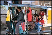 Rickshaw transporting schoolchildren. Jodhpur, Rajasthan, India (color)