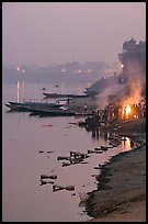 Cremation at Harishchandra Ghat at sunset. Varanasi, Uttar Pradesh, India