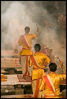 Brahmans standing amongst clouds of incense during puja. Varanasi, Uttar Pradesh, India ( color)
