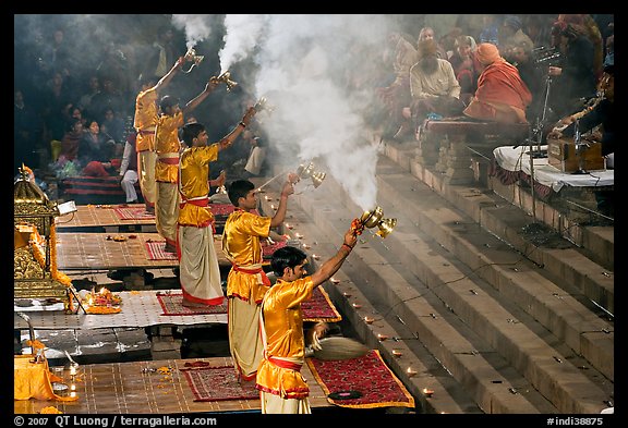 Hindu holy men performing religious arti ceremony. Varanasi, Uttar Pradesh, India (color)