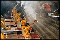Hindu holy men performing religious arti ceremony. Varanasi, Uttar Pradesh, India