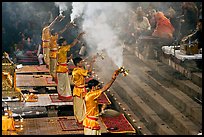 Hindu holy men performing religious arti ceremony. Varanasi, Uttar Pradesh, India (color)