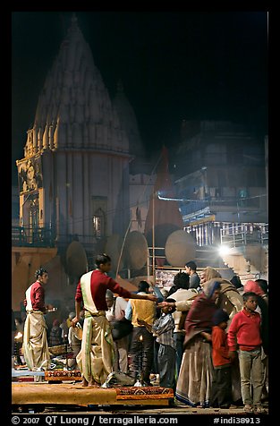 Brahmans giving blessings after evening arti ceremony. Varanasi, Uttar Pradesh, India (color)
