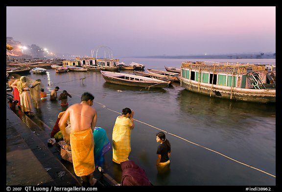 Ritual bath in the Ganga River at dawn. Varanasi, Uttar Pradesh, India