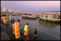 Ritual bath in the Ganga River at dawn. Varanasi, Uttar Pradesh, India