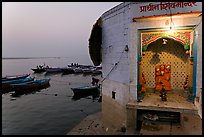 Shrine on the banks of the Ganges River at dawn. Varanasi, Uttar Pradesh, India ( color)