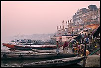 Boats and ghat at sunrise. Varanasi, Uttar Pradesh, India
