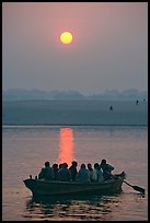 Boat on the Ganges River at sunrise. Varanasi, Uttar Pradesh, India