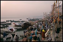 Steps of Dasaswamedh Ghat with crowd at sunrise. Varanasi, Uttar Pradesh, India (color)