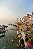 People worshipping Ganges River, early morning. Varanasi, Uttar Pradesh, India (color)