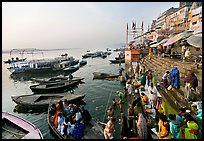 Activity on the steps of Dasaswamedh Ghat, early morning. Varanasi, Uttar Pradesh, India ( color)