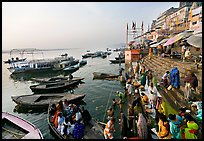 Activity on the steps of Dasaswamedh Ghat, early morning. Varanasi, Uttar Pradesh, India ( color)