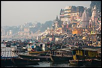 Boats and temples of Dasaswamedh Ghat, sunrise. Varanasi, Uttar Pradesh, India
