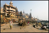 Manikarnika Ghat, with piles of wood used for cremation. Varanasi, Uttar Pradesh, India
